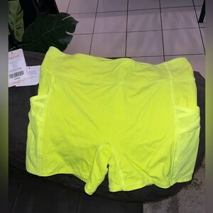 NWT Fabletics neon green/yellow shorts